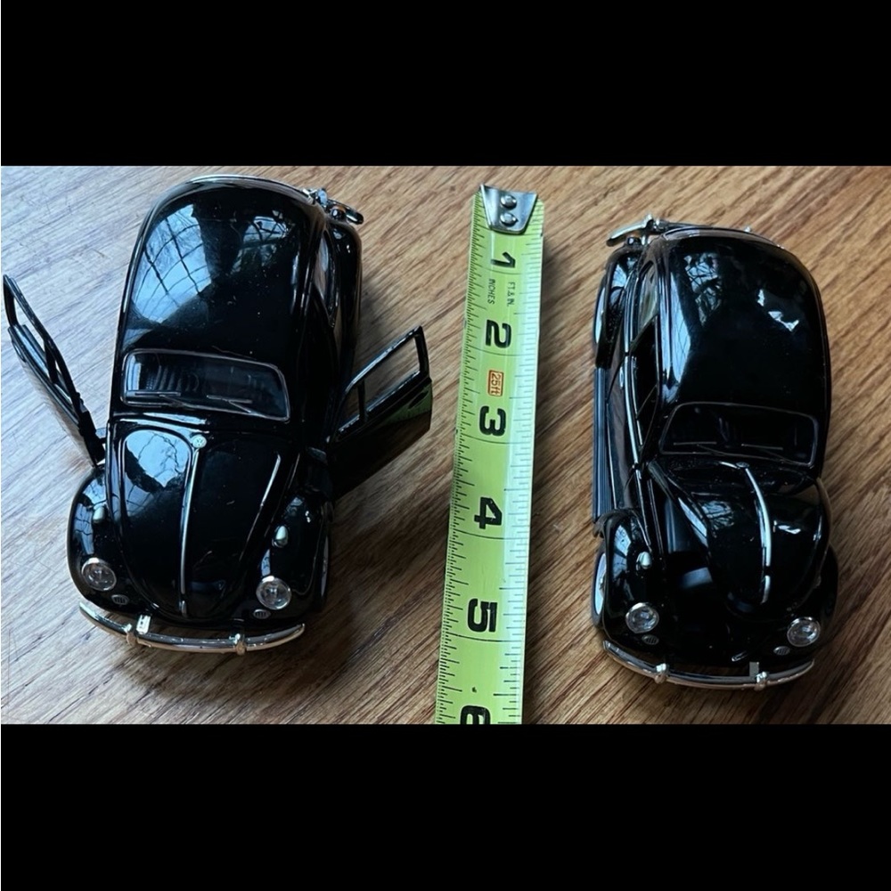 - NWOT - two black beetle 1967 die cast collectible cars